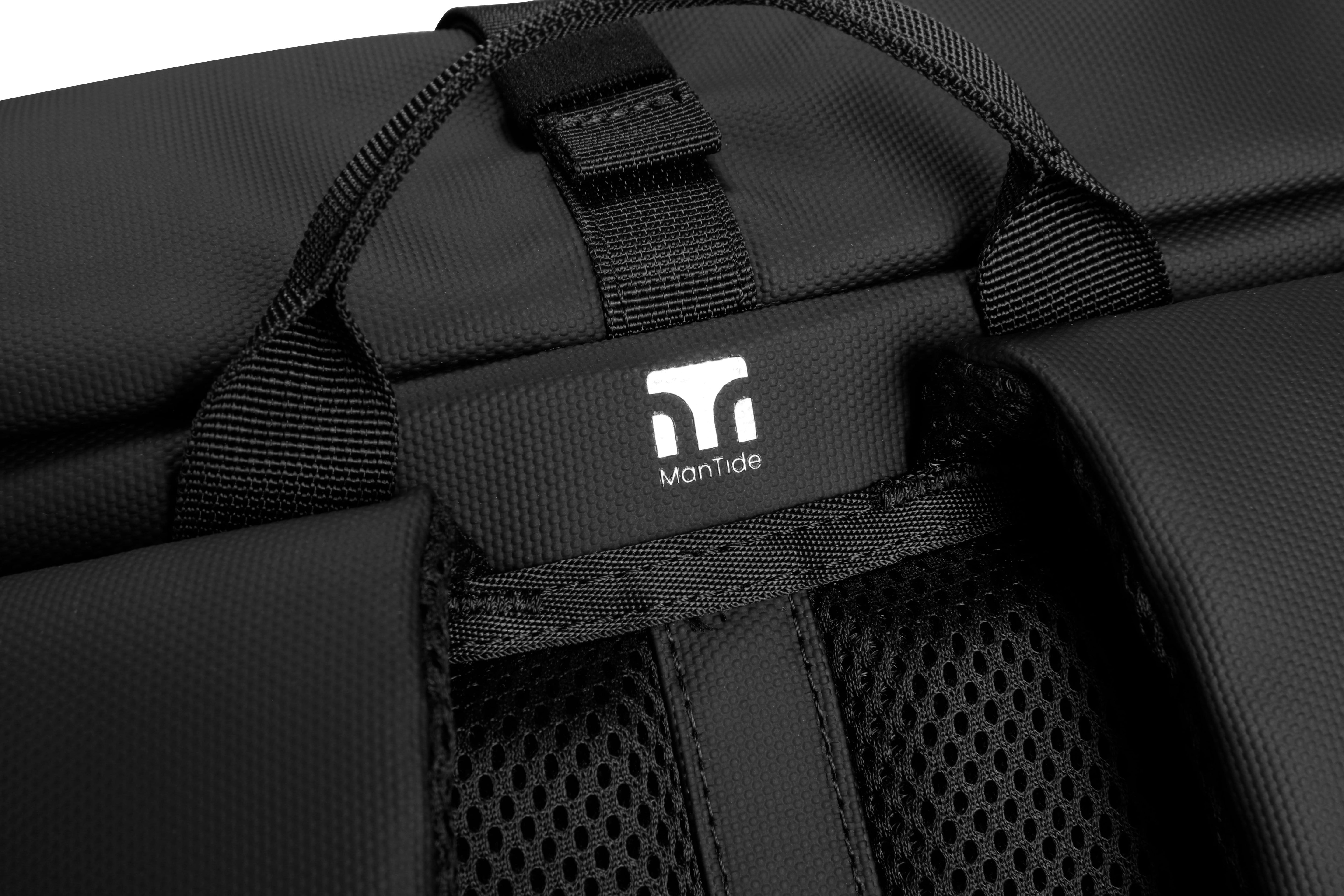 Matte Black TideTrail backpack stylish ManTide logo between carry handle