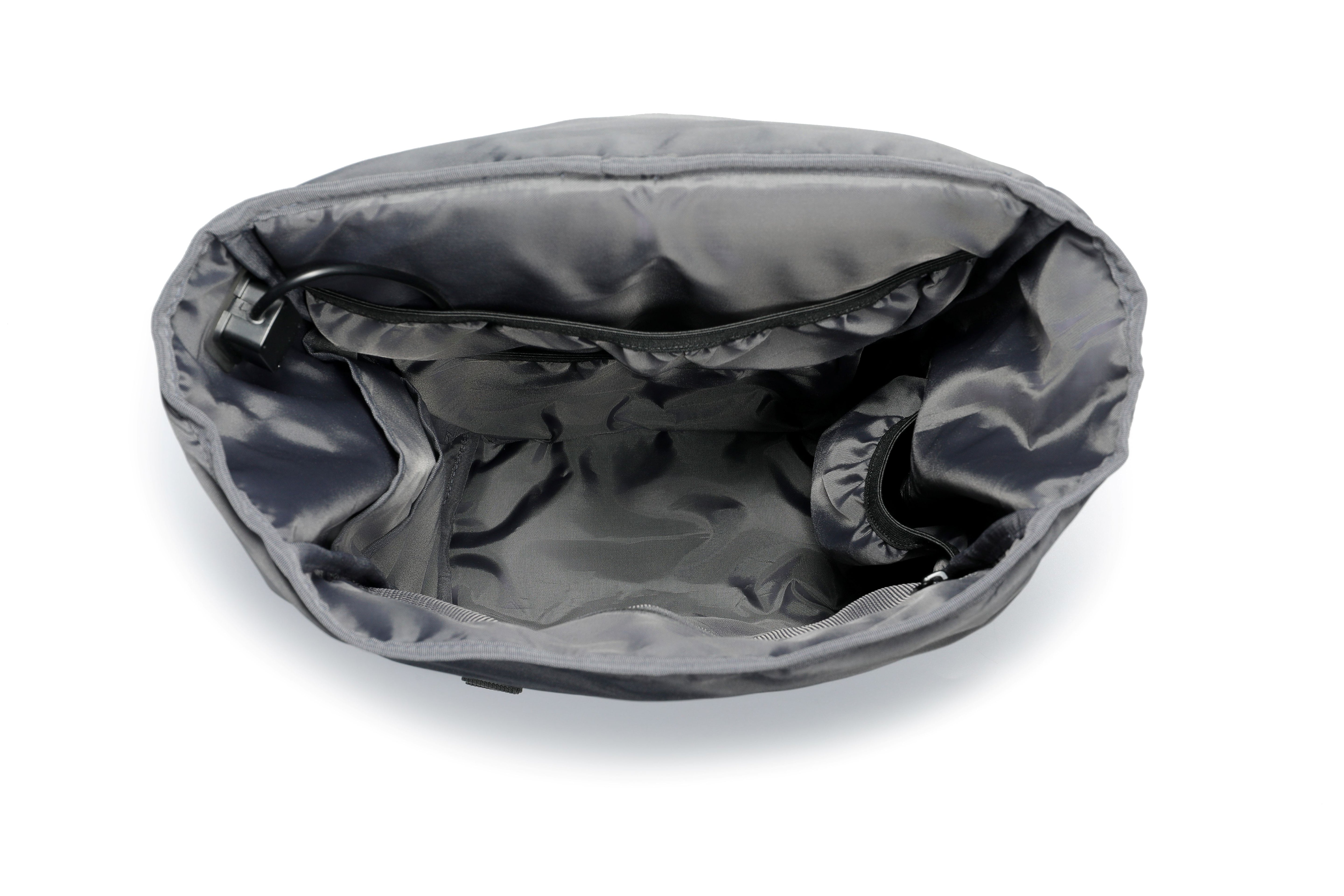 Slate Grey TideTrail internal compartments including side pockets, secured zipper mesh pocket. Also shown is the USB cable for power bank connectivity
